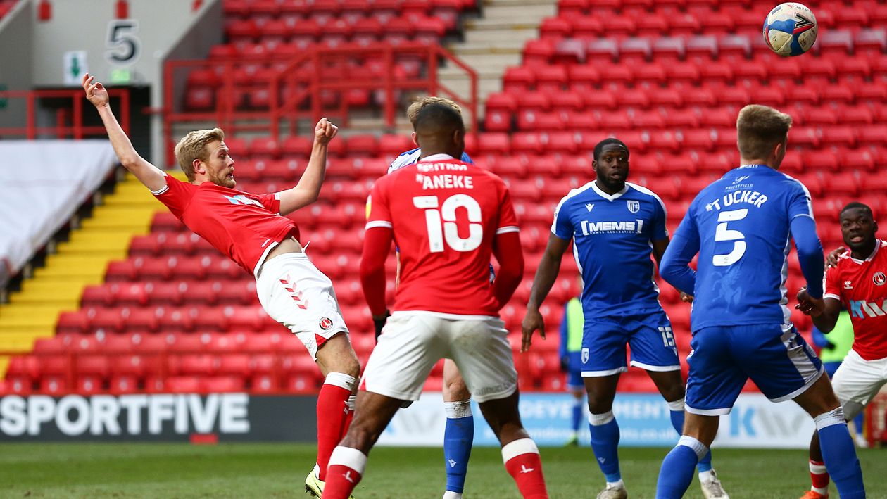 Jayden Stockley scores a header against Gillingham