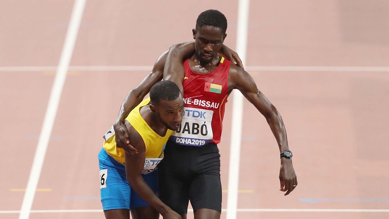 World Championship athletics: Braima Dabo helps fellow runner out in ...