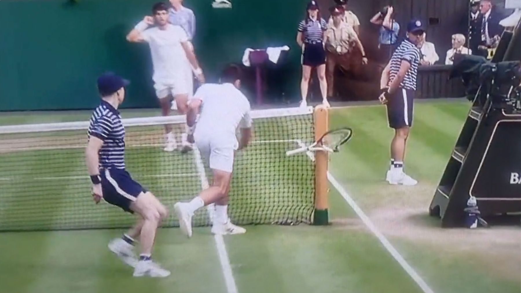 Watch Novak Djokovic smash his racket against the Wimbledon net post