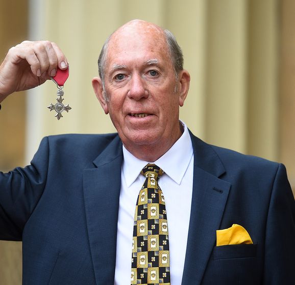 Darts legend John Lowe receives his MBE for services to his sport and