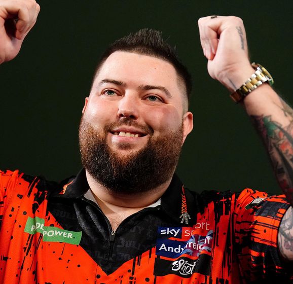 World darts results Defending champion Michael Smith survives second