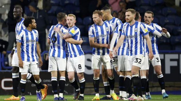 Huddersfield celebrate beating Barnsley.