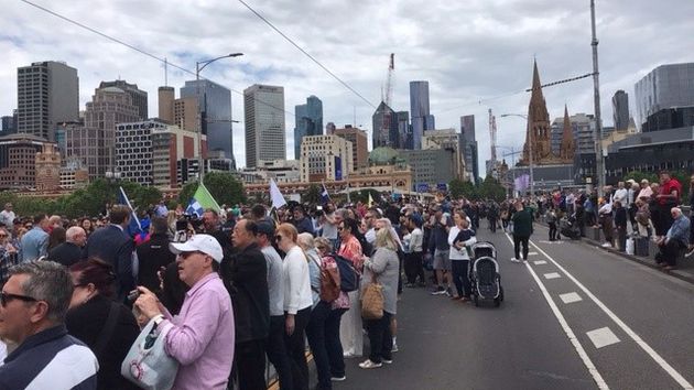 Fans line the streets