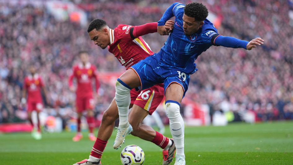 Chelsea's Jadon Sancho challenges for the ball with Liverpool's Trent Alexander-Arnold