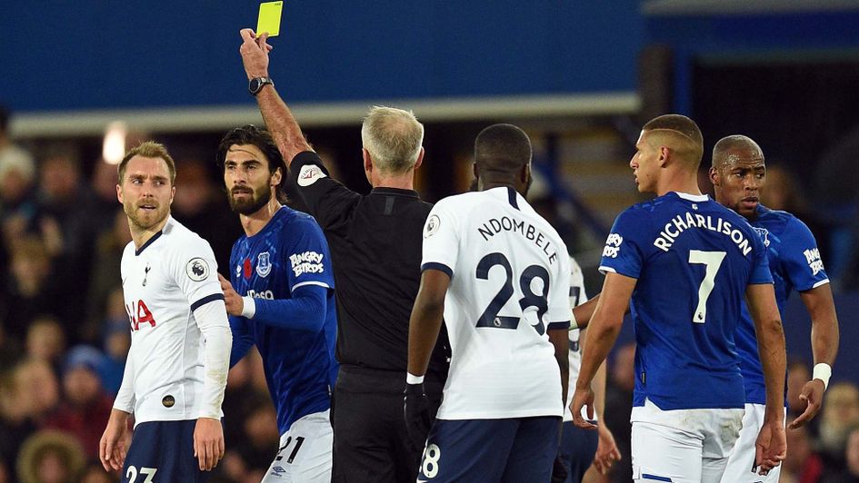 Christian Eriksen is booked during Everton v Tottenham in the Premier League