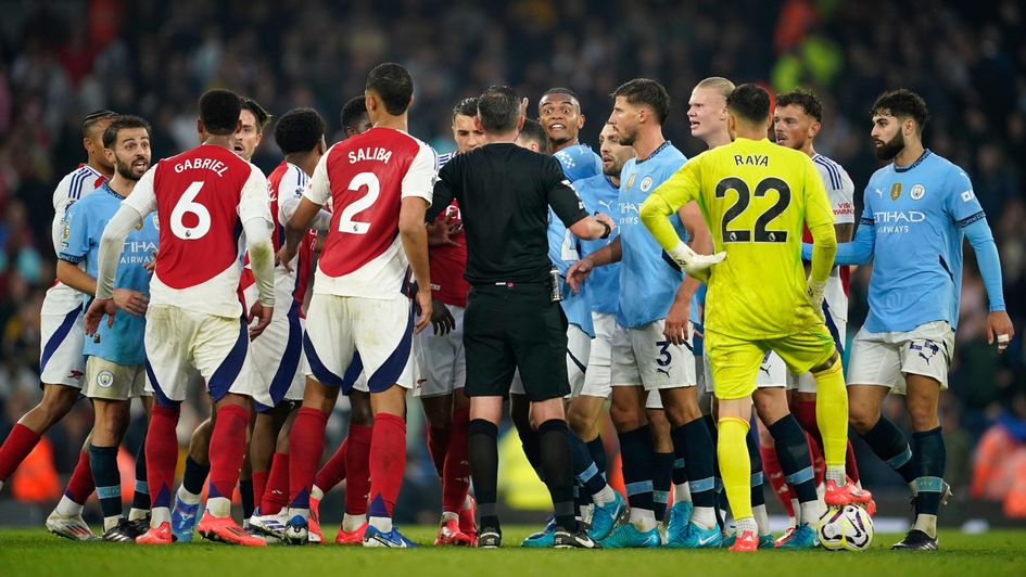 Manchester City and Arsenal players clash in the closing stages