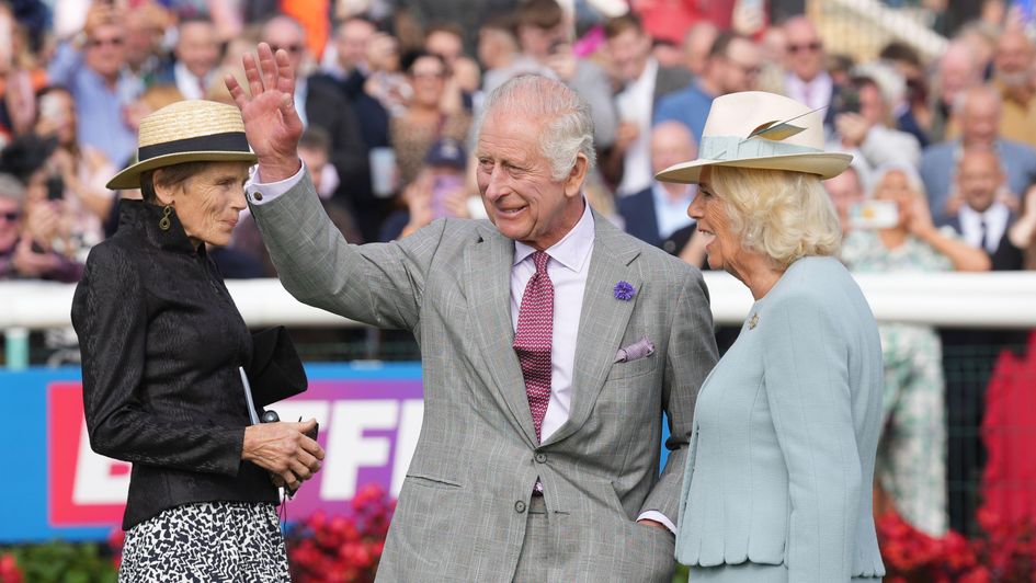 The King waves to the crowd at Doncaster