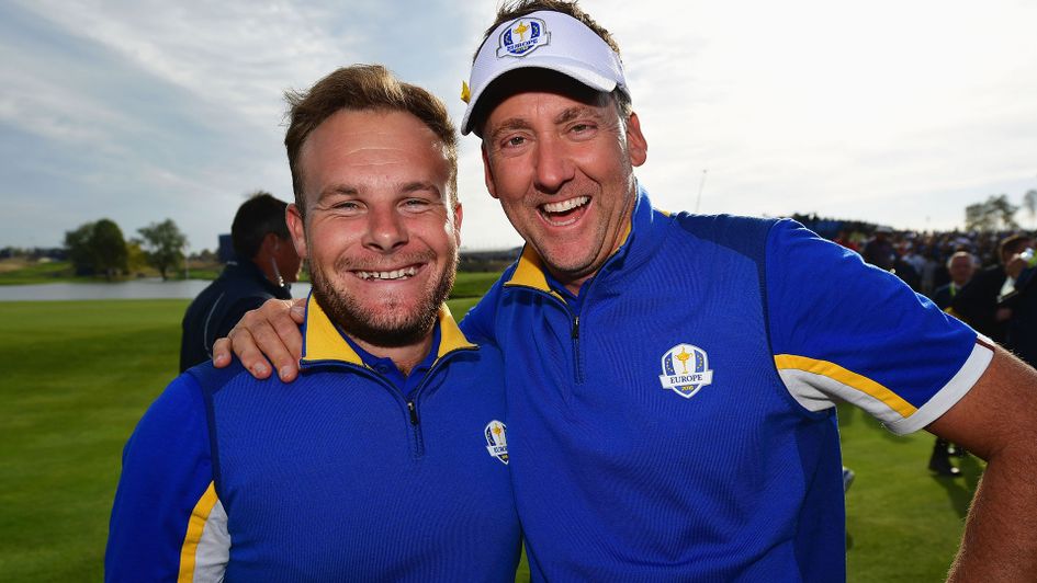 Tyrrell Hatton and Lee Poulter celebrate Europe's win in Paris