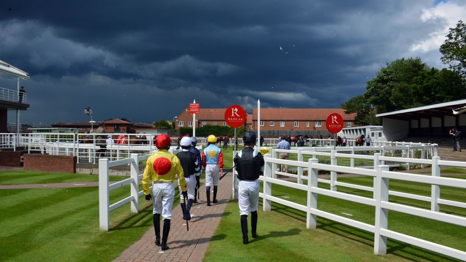 Jockeys head to the parade ring at Redcar