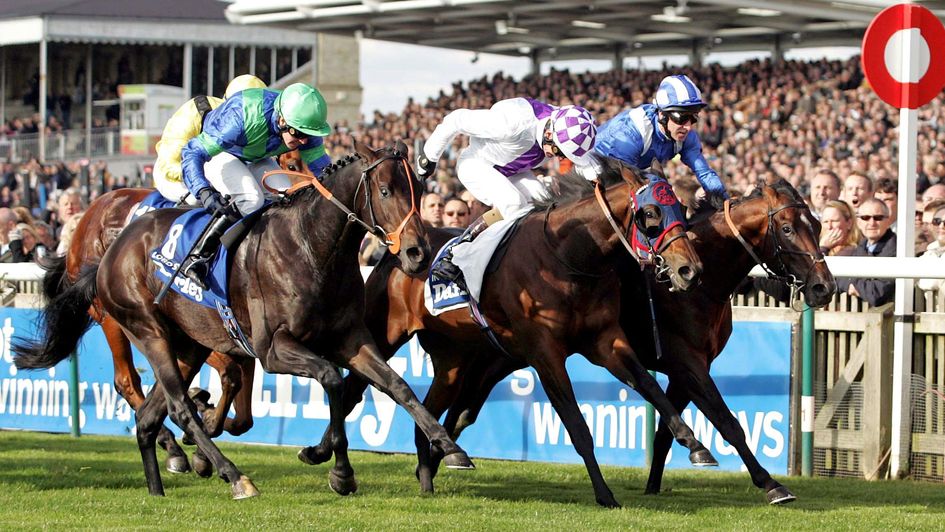 Intense Focus (centre) wins the Dewhurst