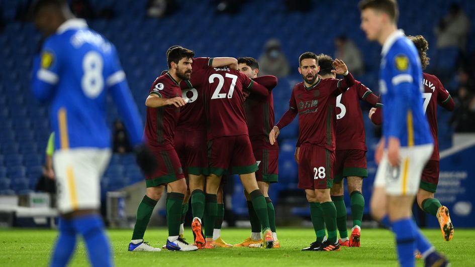 Wolves celebrate Romain Saiss' goal against Brighton