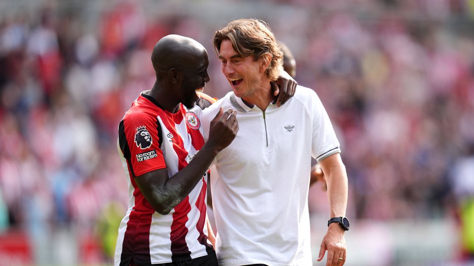 Brentford manager Thomas Frank and Yoane Wissa celebrate