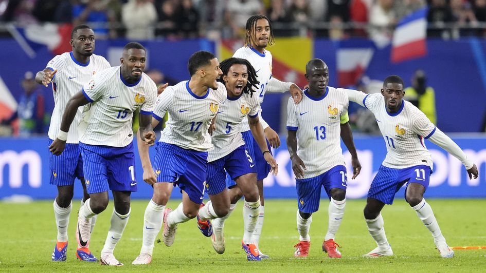 France celebrate winning their shootout against Portugal