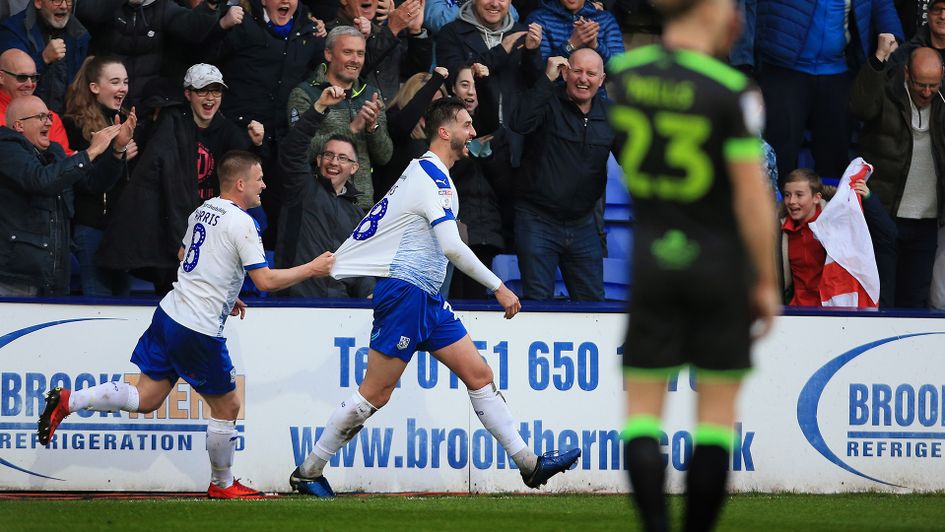 Oliver Banks celebrates after scoring against Forest Green