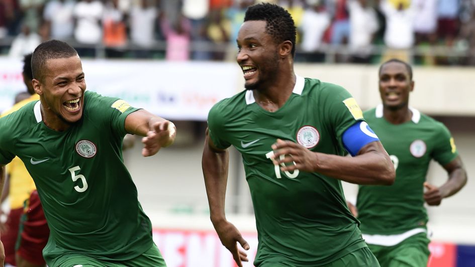 Mikel John Obi celebrates after scoring for Nigeria