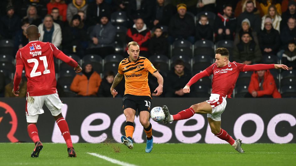 Matty Cash blocks a shot from Hull's Kamil Grosicki