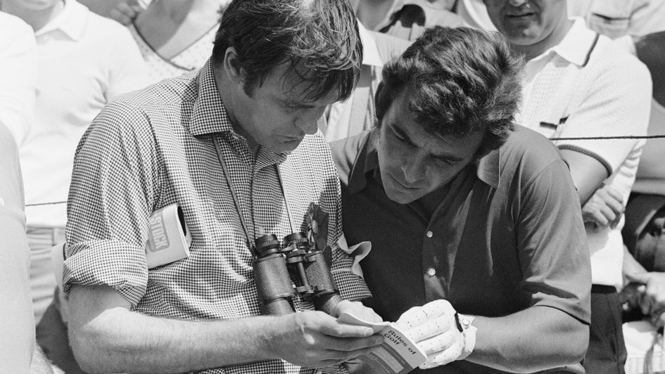 Tony Jacklin (right) studies the rule book