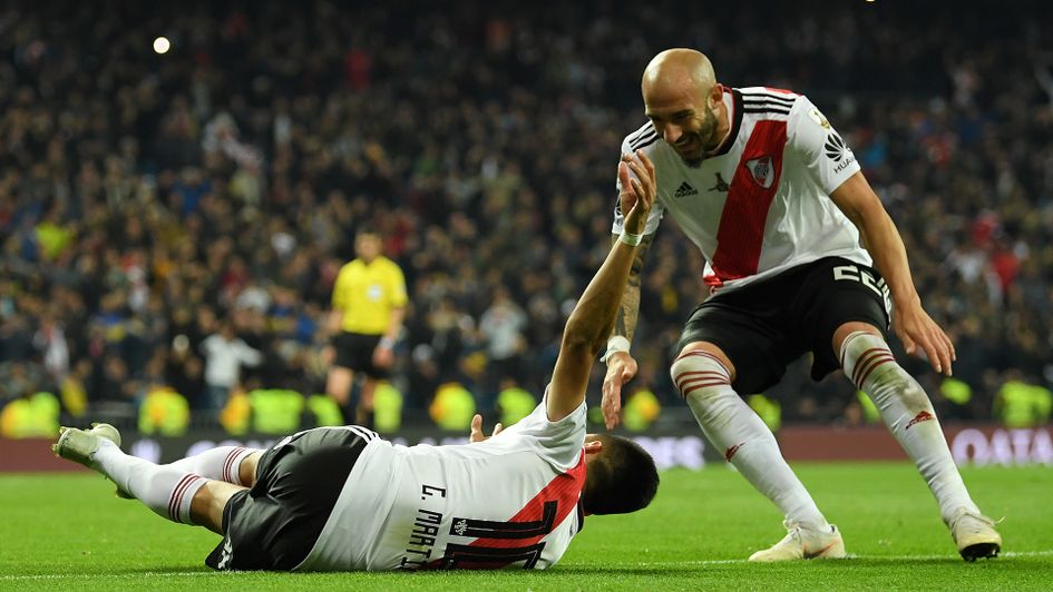 Gonzalo Martinez (left) celebrates River Plate's third goal