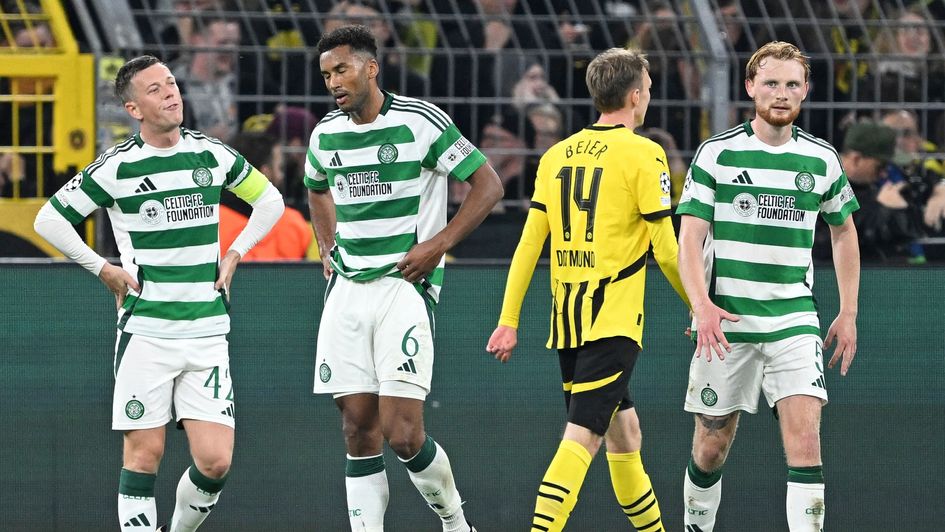 Celtic players show a look of dejection after conceding the goal to make it 7-1 against Dortmund