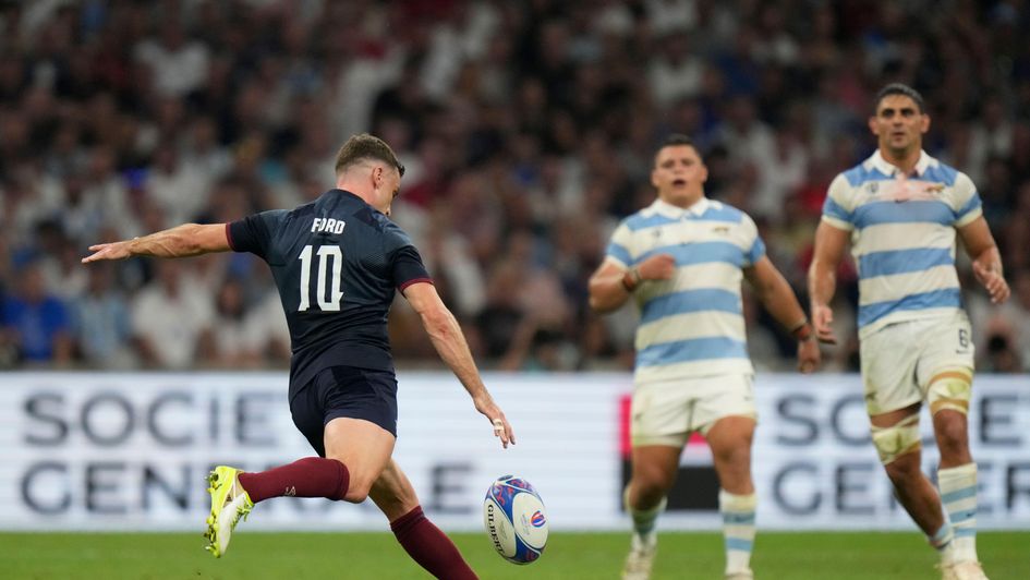 George Ford kicks a drop-goal for England