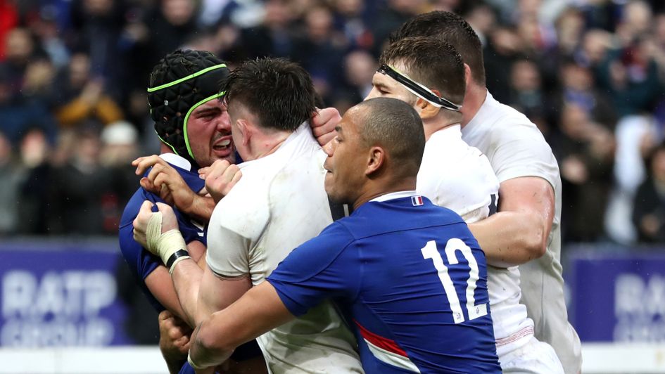 Tempers flare during the Guinness Six Nations match at the Stade de France, Paris.