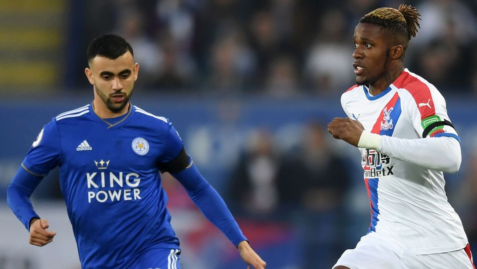 Wilfried Zaha is challenged by Rachid Ghezzal