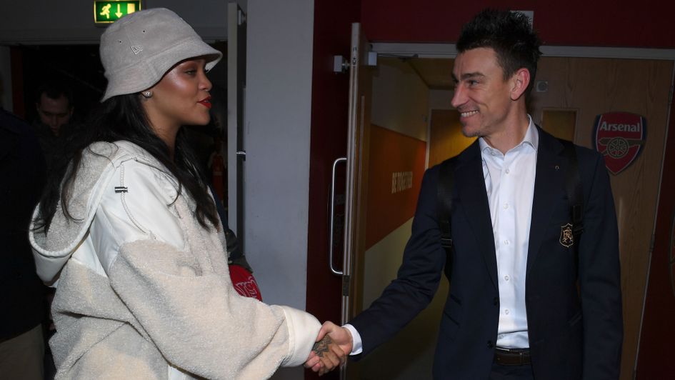 Rihanna shakes hands with Laurent Koscielny