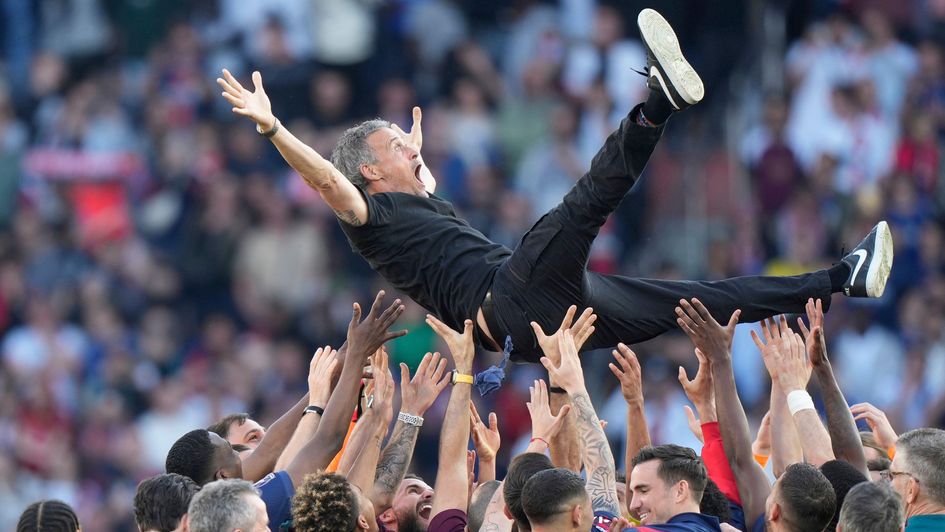 PSG players celebrate with Luis Enrique
