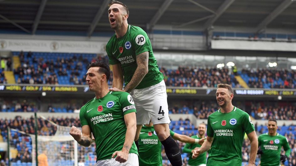 Brighton celebrate after scoring against Cardiff