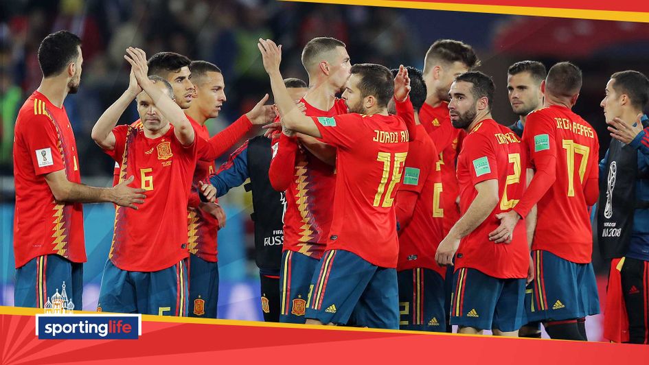 Spain sneaked top spot in Group B after a dramatic night