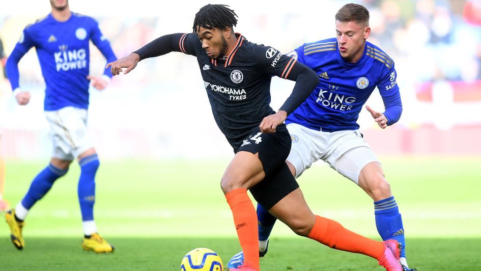 Reece James of Chelsea and Harvey Barnes of Leicester battle for the ball