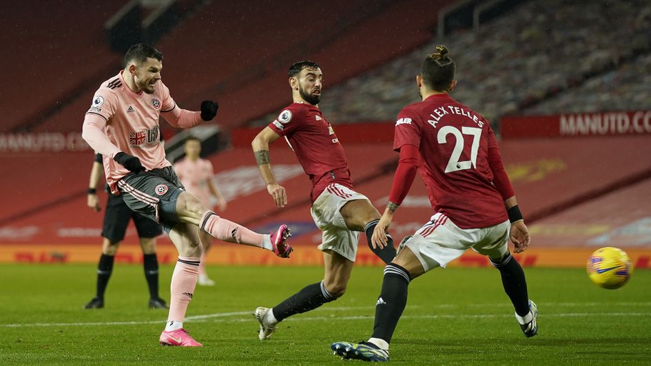 Sheffield United's Oliver Burke scores against Manchester United