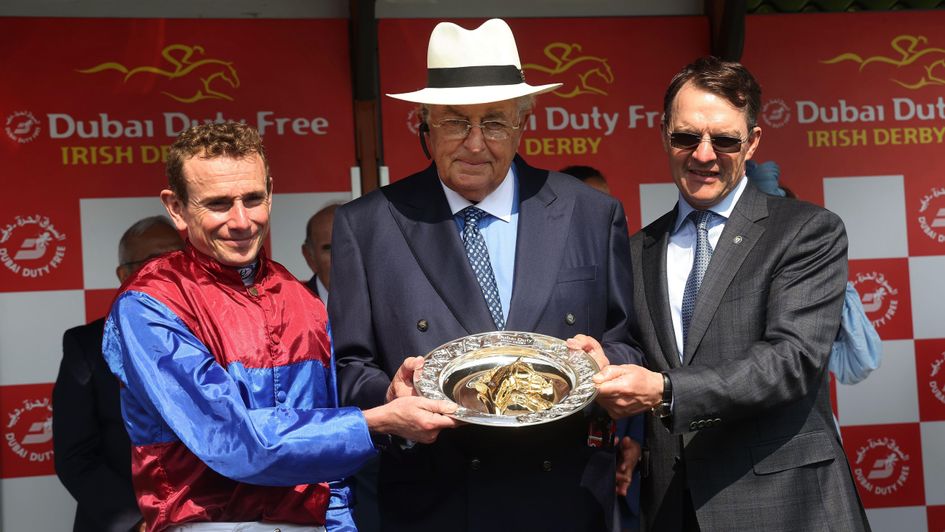Connections of Los Angeles collect the Irish Derby trophy