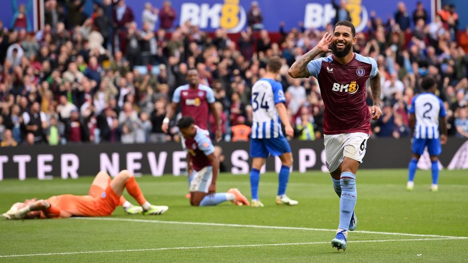 Douglas Luiz celebrates a goal against Brighton