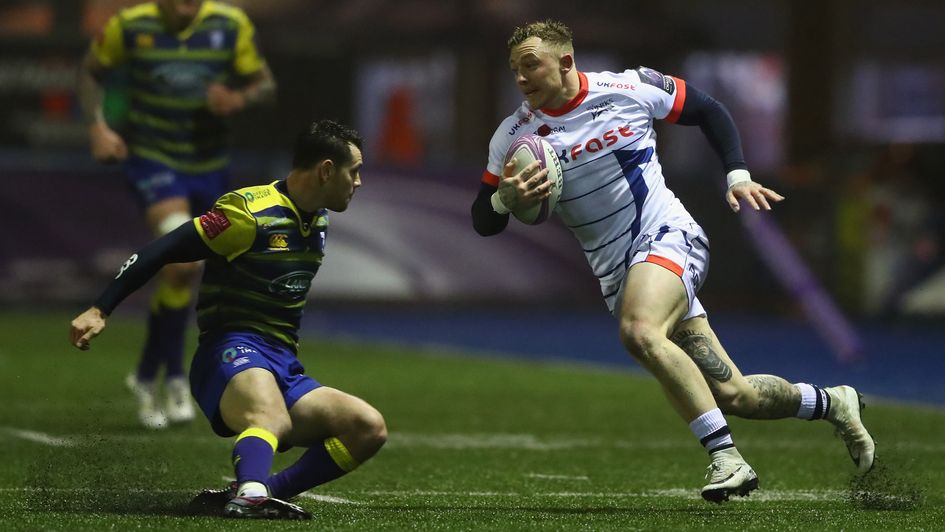 Josh Charnley of Sale moves smartly to avoid a tackle