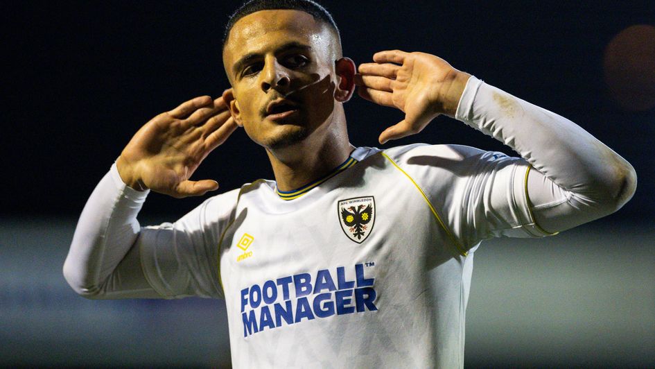 Ali Al-Hamadi of AFC Wimbledon scores and celebrates