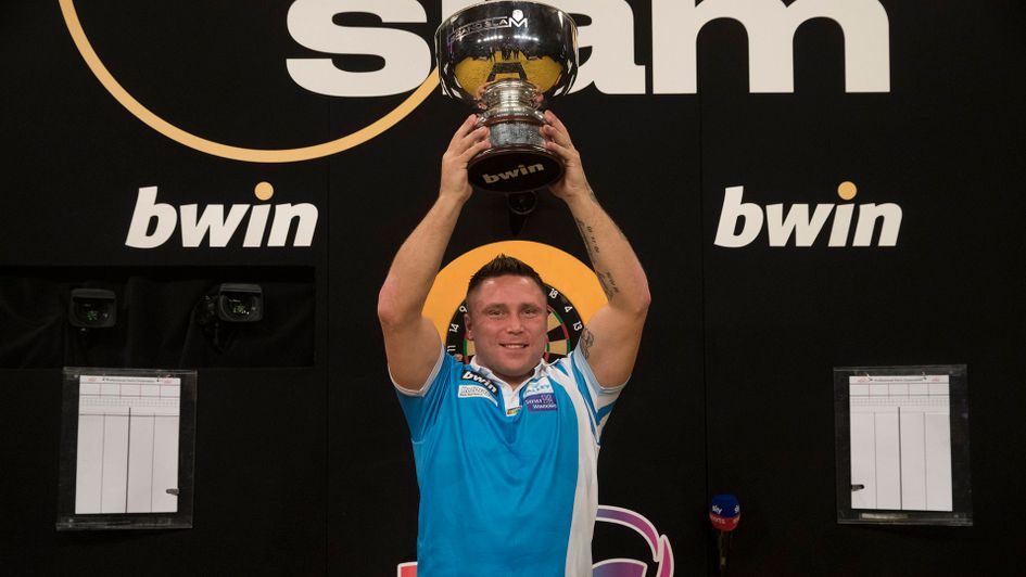 Gerwyn Price lifts the Eric Bristow Trophy (Picture: Lawrence Lustig/PDC)