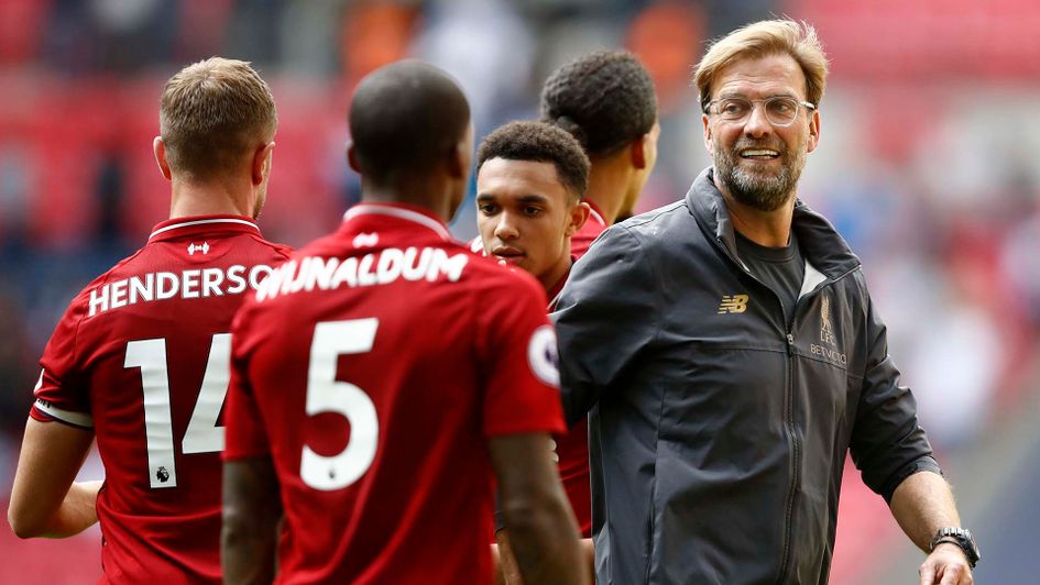 Jurgen Klopp celebrates with his Liverpool players