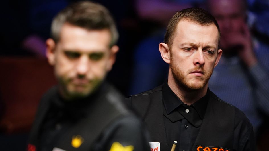 Mark Allen watches on during a match against Mark Selby