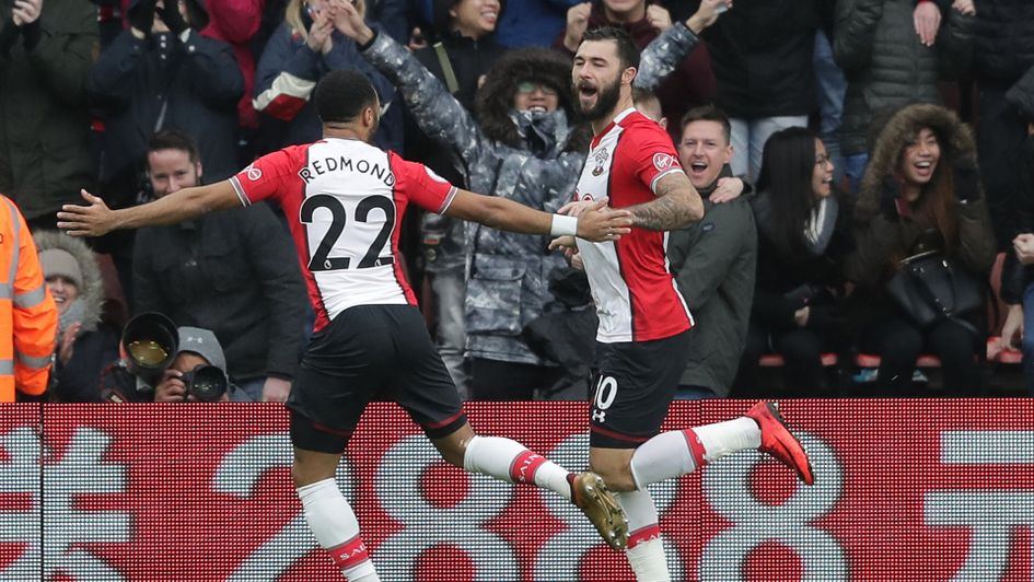 Charlie Austin celebrates his opening goal