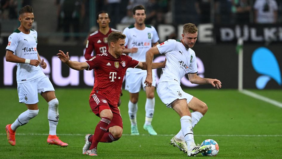 Christoph Kramer and Joshua Kimmich fight for the ball