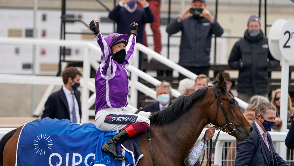 Frankie Dettori enters the winners' enclosure on Mother Earth