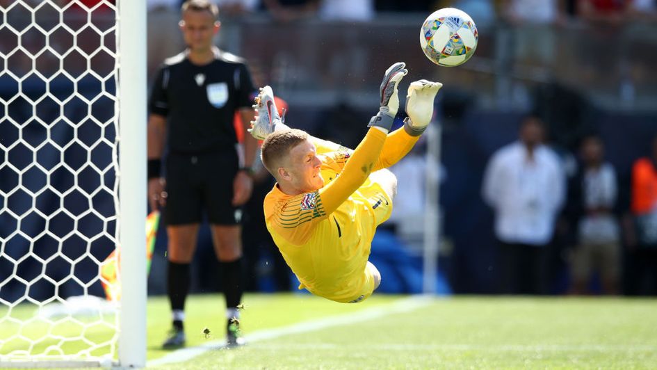 Jordan Pickford makes the save to win a penalty shootout for England against Switzerland in the UEFA Nations League