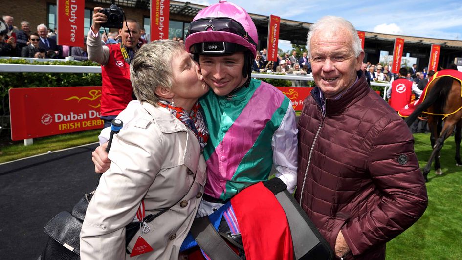 Colin Keane gets a kiss from mum after the Irish Derby