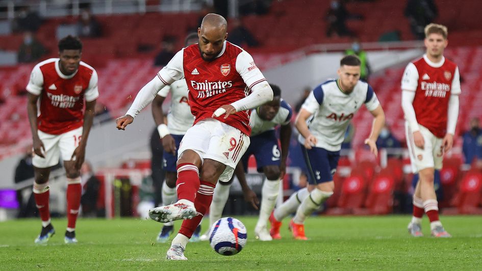 Alexandre Lacazette scores the winning penalty in the North London derby