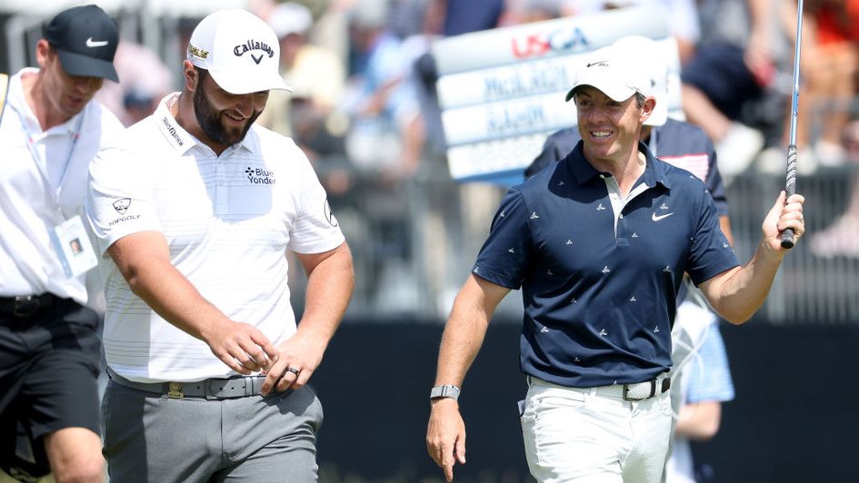 Jon Rahm and Rory McIlroy during Monday's practice round