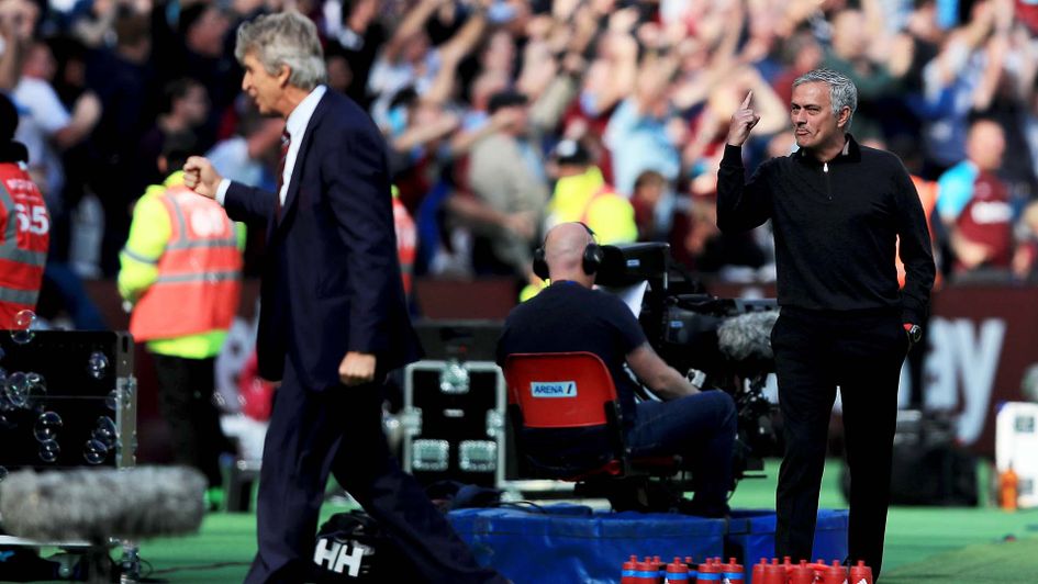 Manuel Pellegrini and Jose Mourinho on the sidelines during West Ham v Man Utd