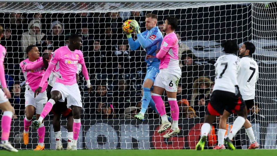 Bernd Leno of Fulham claims a set piece ball as Southampton look to win the game in added time