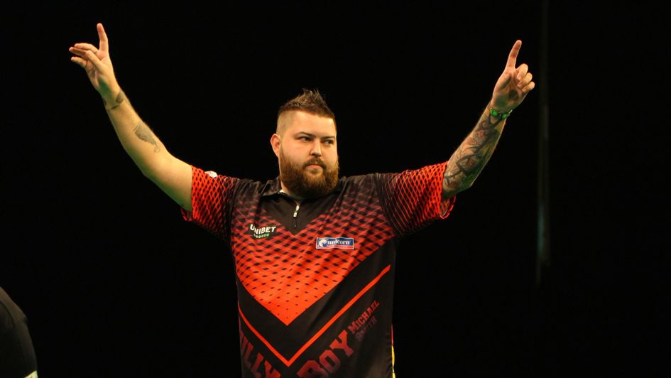 Smith thrilled to hit nine-dart finish in Dublin...but son still be critical!