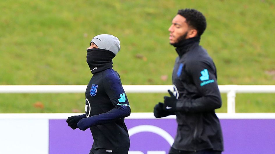 Raheem Sterling and Joe Gomez train alongside each other